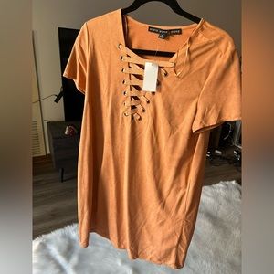 NWT HYFVE dress. Size M. Short sleeve. Light orange color. Lace up neck